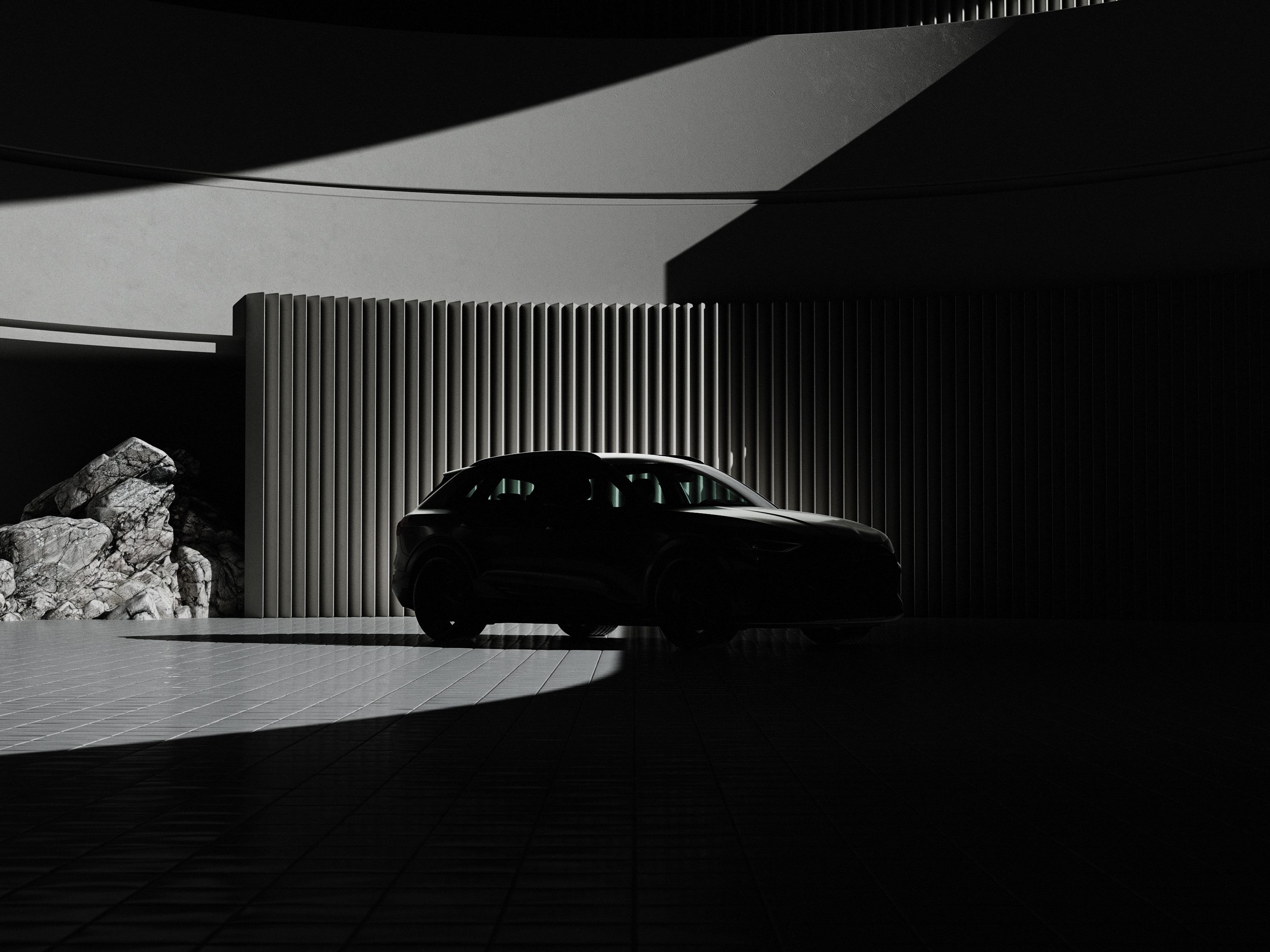 Car in front of a wall